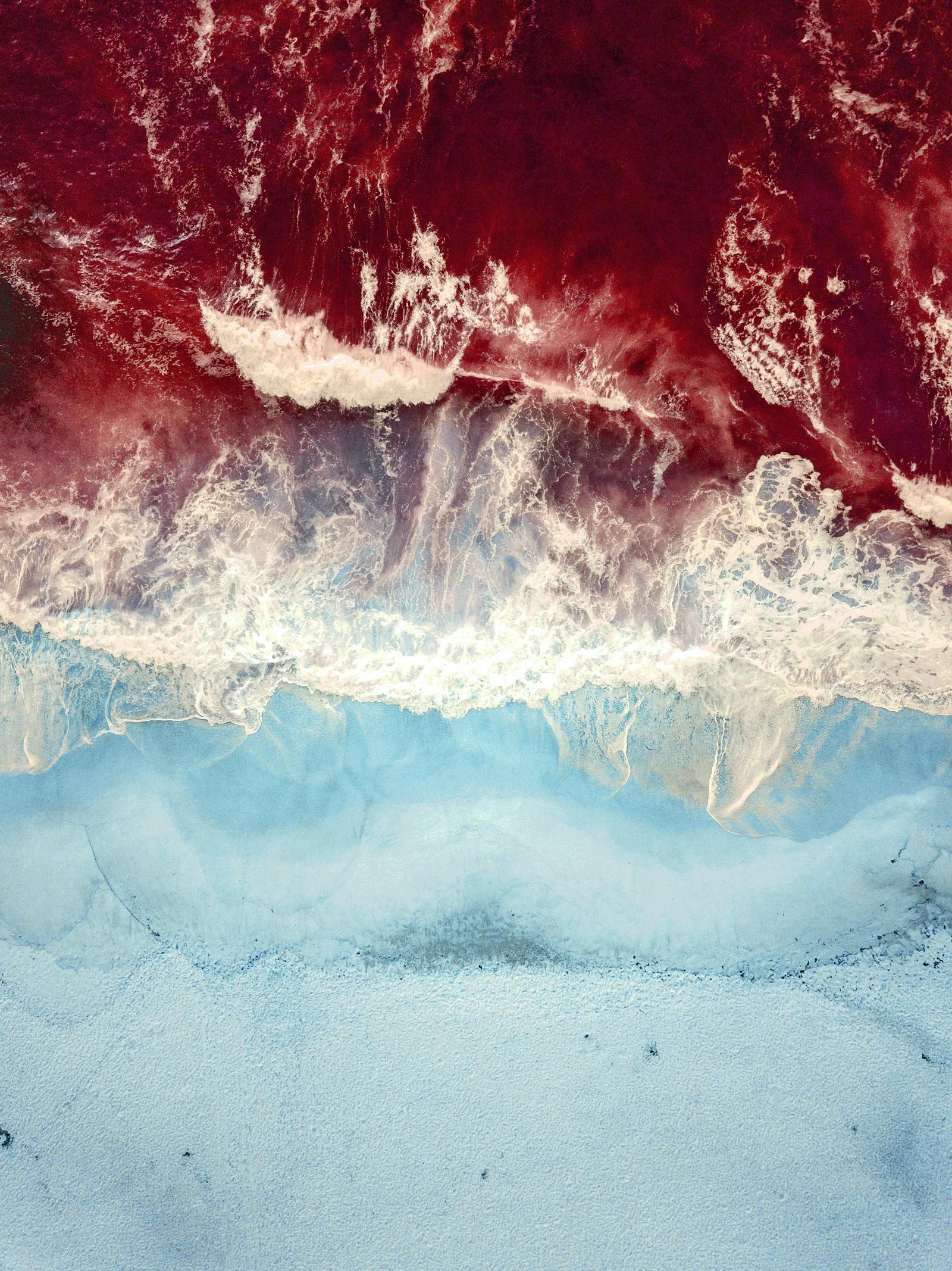 Man on jet ski surrounded by sea spray